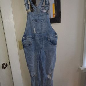 Ripped denim overalls